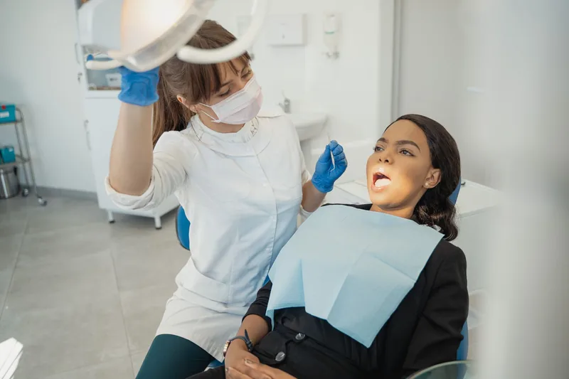 Dentist treating a patient in a modern clinic